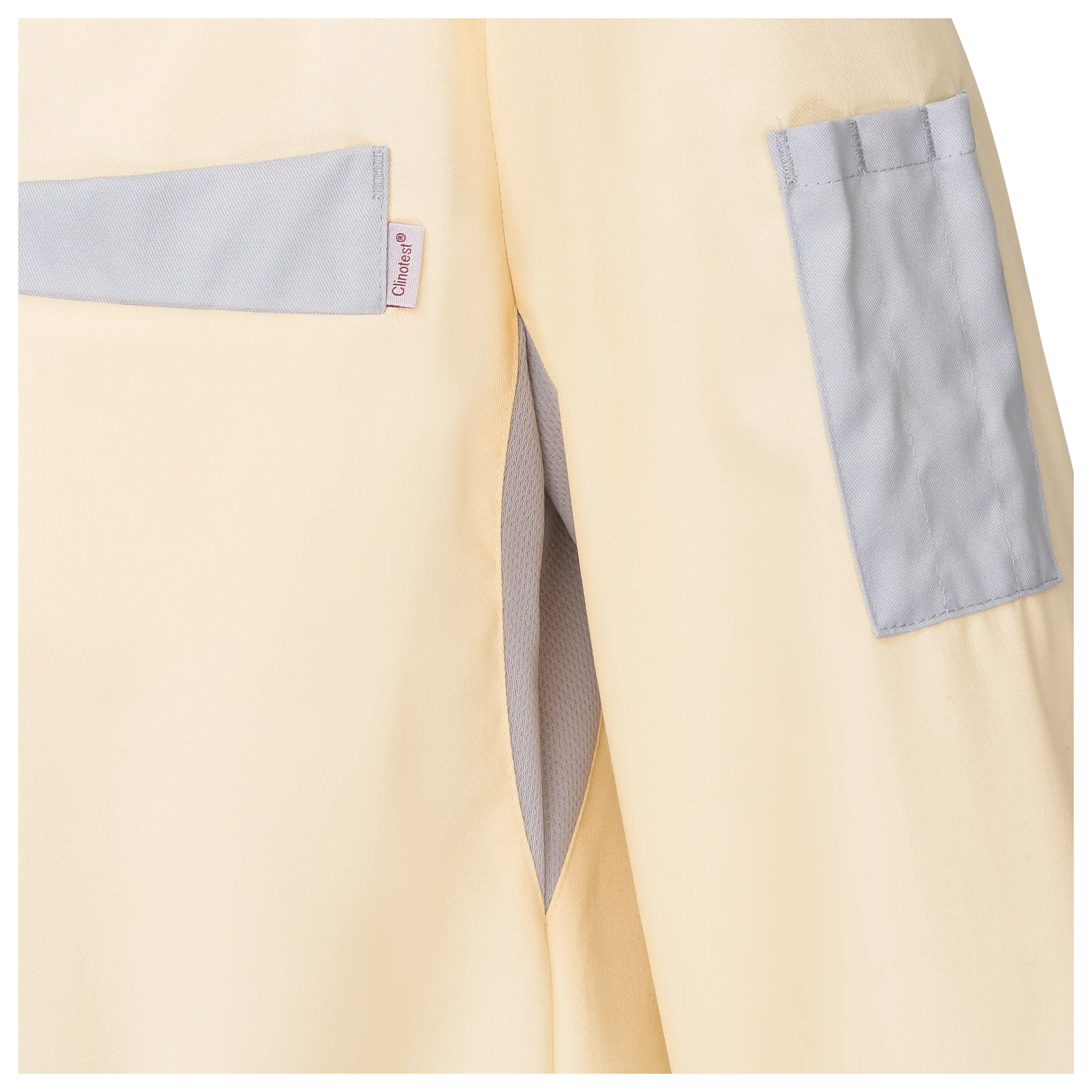 PRO-ducto GmbH Professionelle Produktfotografie als Freisteller: Detailansicht einer hellgelben Arbeitsjacke mit grauen Taschen für mehr Sichtbarkeit und Umsatz. Produktfotografie