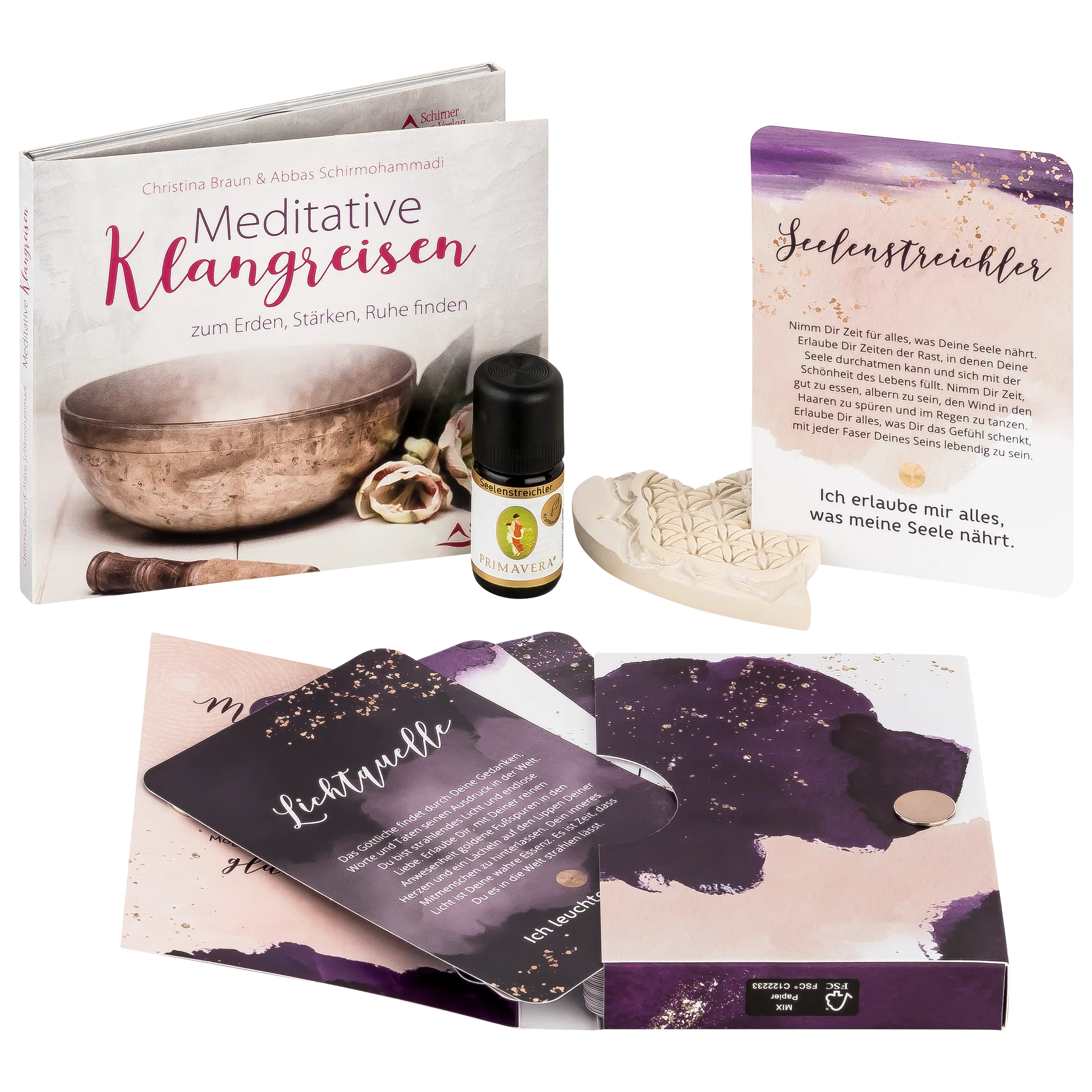 Professionelle Produktfotografie von Meditations-Set mit Buch, ätherischem Öl von Primavera und Inspirationskarten.