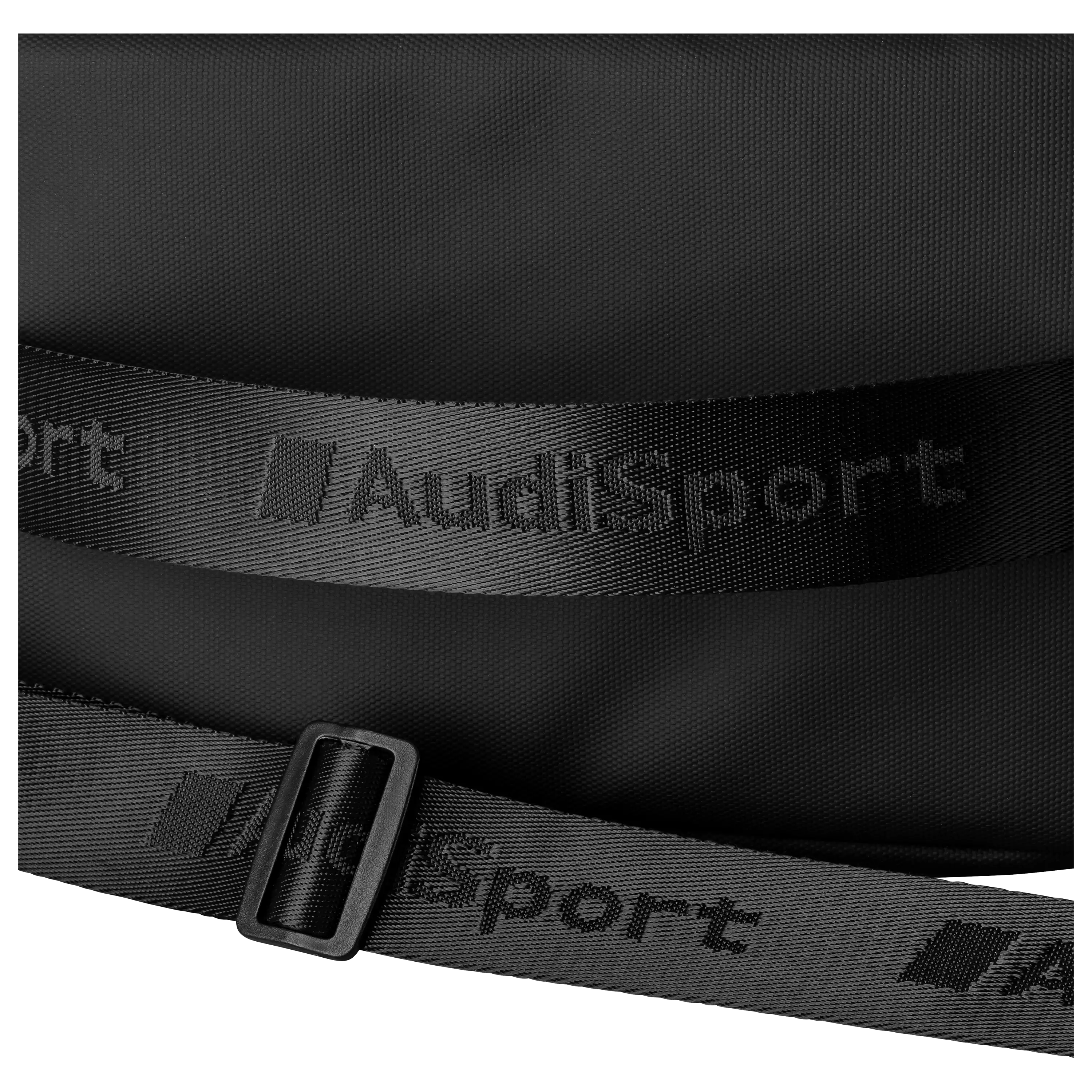 Professionelle Produktfotografie von PRO-ducto GmbH: Schwarzes Textilband mit Audi Sport Logo und Schnalle.