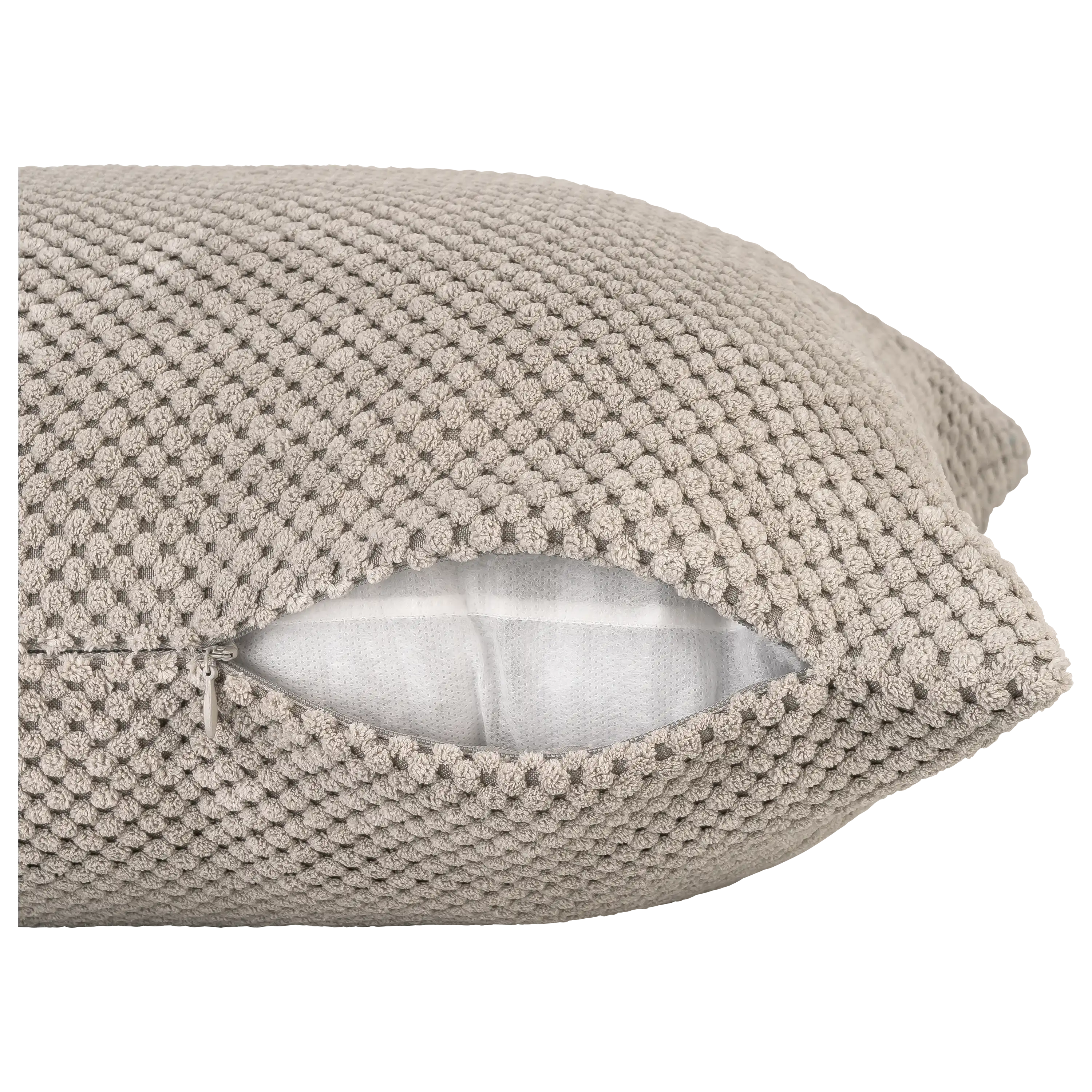 Professionelle Produktfotos von PRO-ducto GmbH: Detailansicht eines beigen Kissenbezugs mit Reißverschluss.