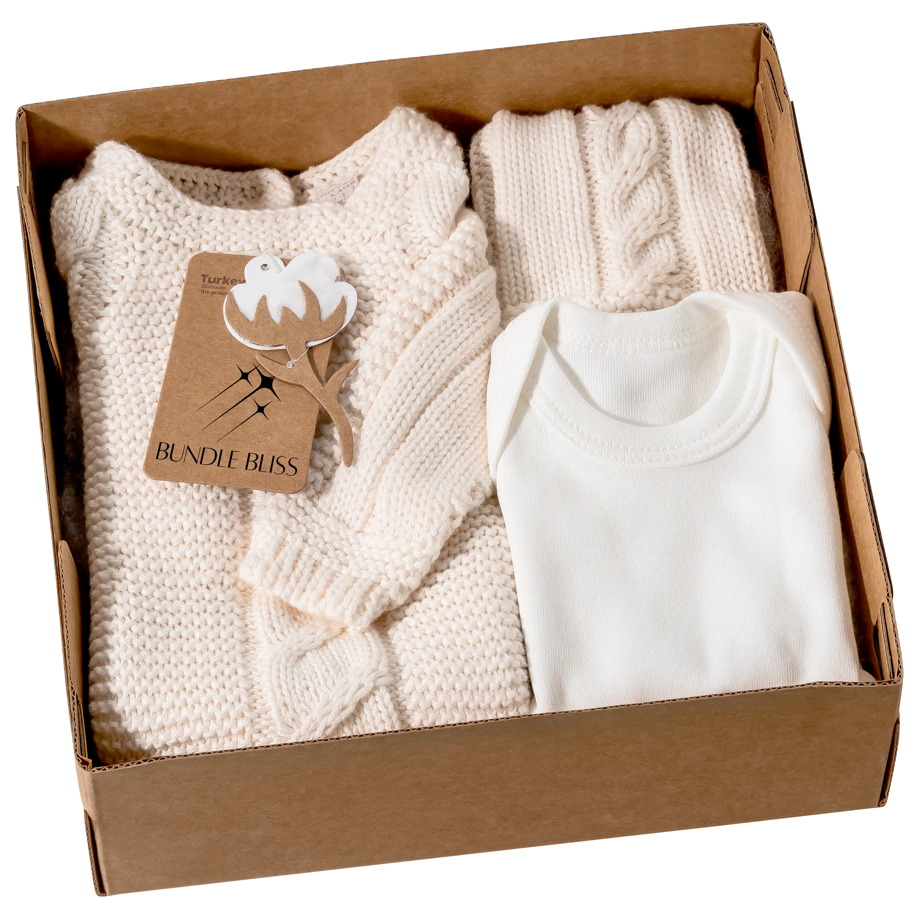 Professionelle Produktfotografie von Babykleidung in einer Geschenkbox, ideal für Textilfotografie und hochwertige Produktbilder von PRO-ducto GmbH.