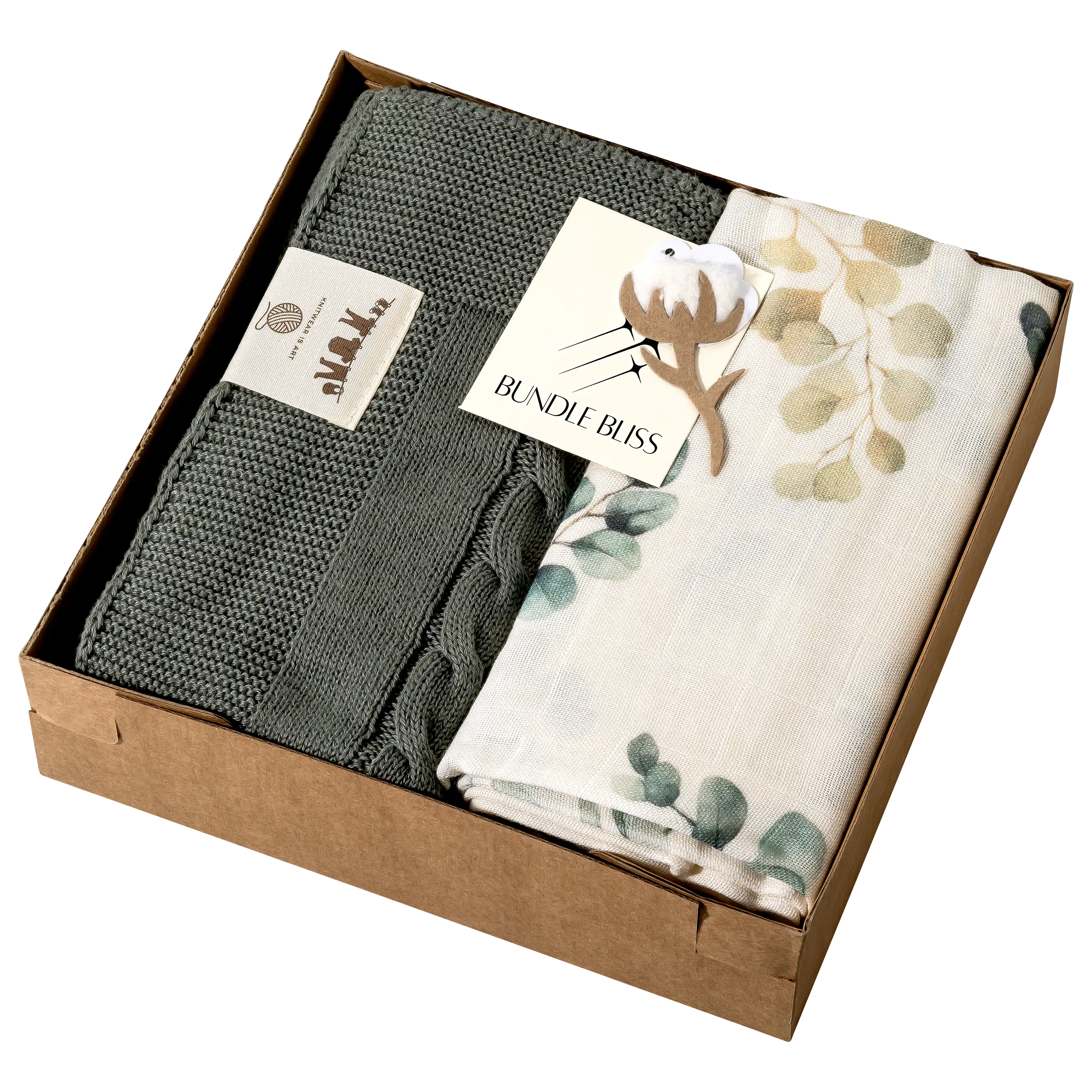 Geschenkbox mit gestrickter Decke und gemustertem Tuch für professionelle Produktfotografie von PRO-ducto GmbH.